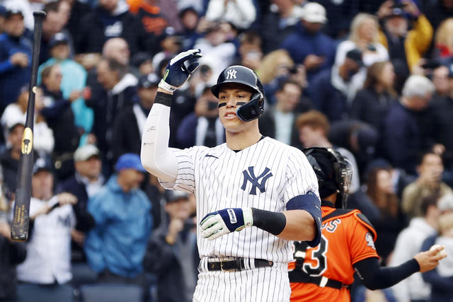 Judge hits 62nd HR, Cole Ks record as Yankees split in Texas
