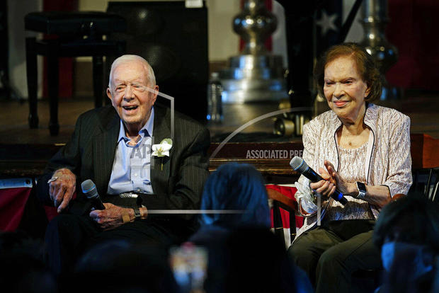 Former President Jimmy Carter and his wife former first lady Rosalynn Carter sit together during a reception to celebrate their 75th wedding anniversary Saturday, July 10, 2021, in Plains, Georgia. 
