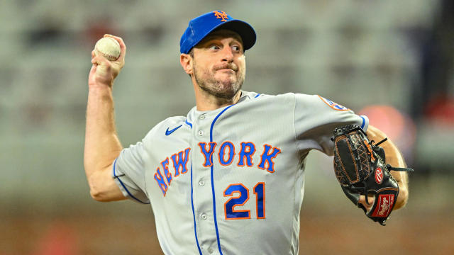 New York starting pitcher Max Scherzer (21) throws a pitch during the MLB game between the New York Mets and the Atlanta Braves on October 1st, 2022 at Truist Park in Atlanta, GA. 