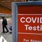 CDC eases COVID vaccination rule on international travelers, as expiration looms