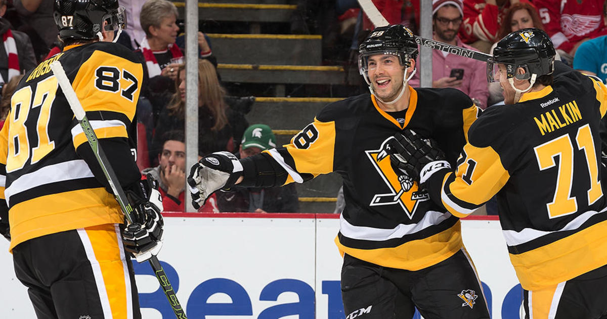 Evgeni Malkin changes course, re-signs with Penguins on 4-year deal