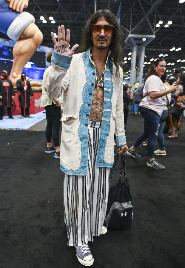 A cosplayer dressed as Klaus Hargreeves from "Umbrella Academy" poses during day 1 of New York Comic Con on October 06, 2022 in New York City. 