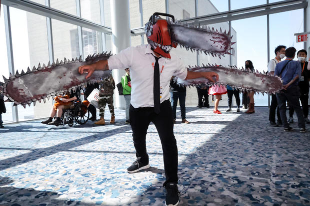 A Chainsaw Man cosplayer poses during New York Comic Con 2022 on October 07, 2022 in New York City. 