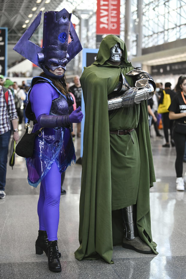 Cosplayers are seen as Galactus and Dr. Doom during day 2 of New York Comic Con on October 07, 2022 in New York City. 