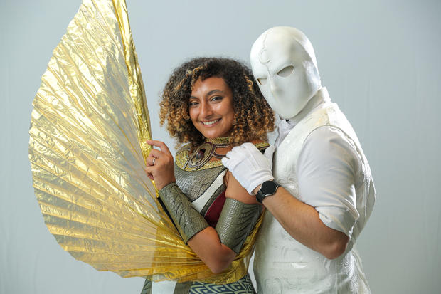 Cosplayers dressed as Scarlet Scarab and Mr. Knight attend New York Comic Con on October 07, 2022 in New York City. 