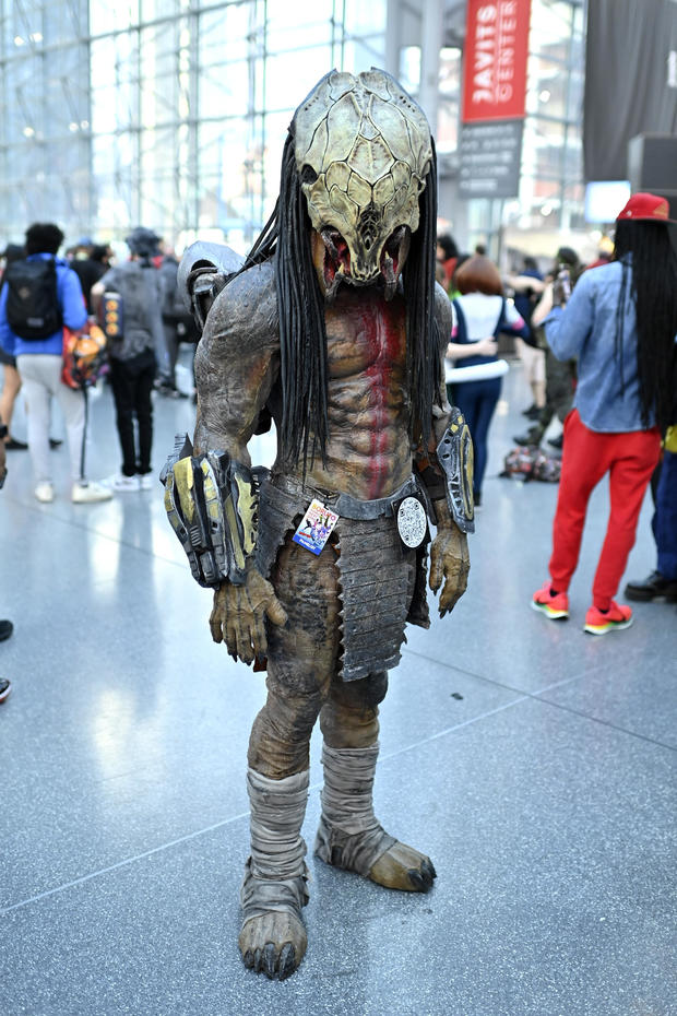 A Predator cosplayer poses during New York Comic Con 2022 on October 07, 2022 in New York City. 