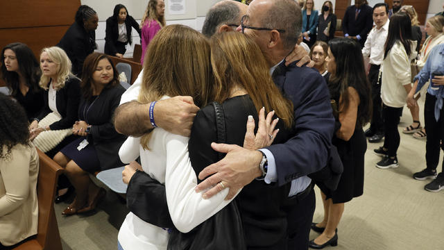 Families embrace in court 