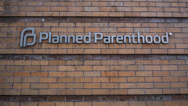 Bill Tompkins  Planned Parenthood signage Archive 