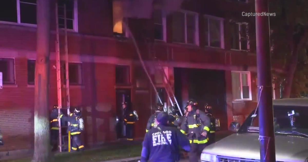 Grand Crossing apartment catches fire - CBS Chicago