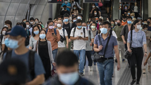 Commuters wearing face masks in Hong Kong 