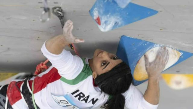 cbsn-fusion-iranian-rock-climber-who-competed-without-a-hijab-returns-to-tehran-thumbnail-1392063-640x360.jpg 