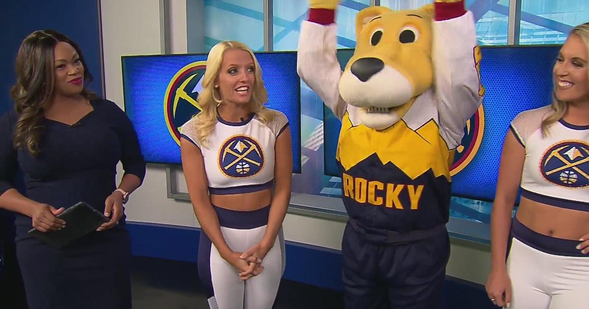 Rocky helps First at 4 anchors get ready for the Denver Nuggets home