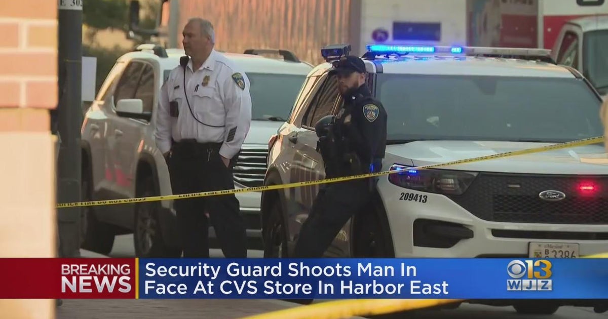 Accused robber wielding syringe shot in the face by security guard in ...