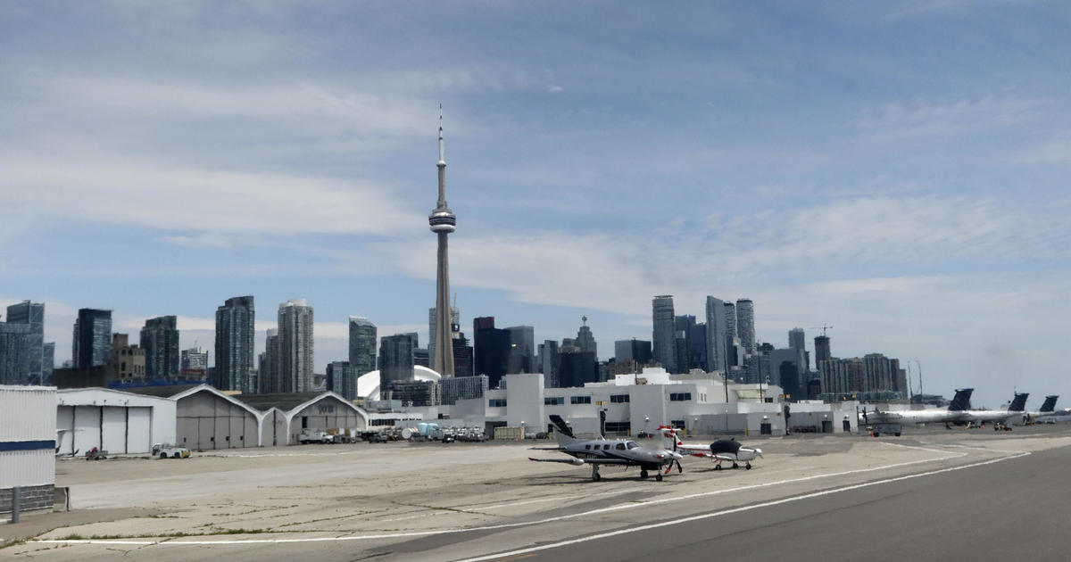Suspicious device triggers Toronto island airport evacuation, 2 detained