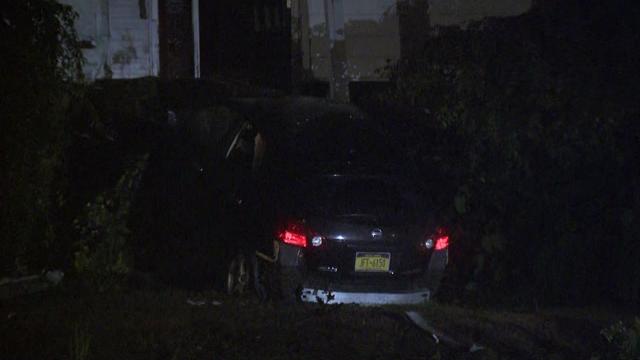 A vehicle partially crashed into a home. 