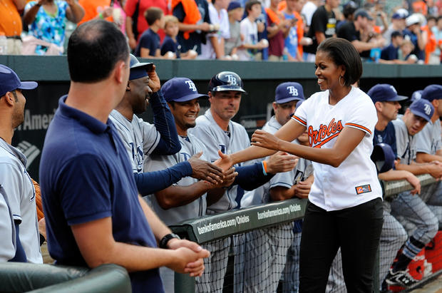 Michelle Obama shakes hands with Tampa Bay Rays baseball players 
