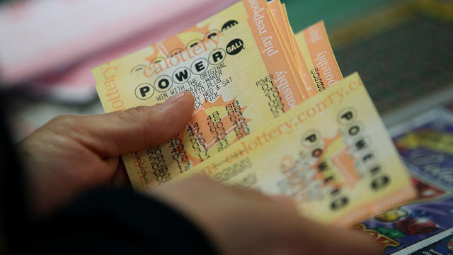 A customer buys Powerball tickets at Kavanagh Liquors on January 13, 2016, in San Lorenzo, California. 