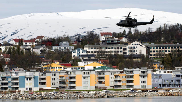 FILE PHOTO: A helicopter patrols off Tromsoe 