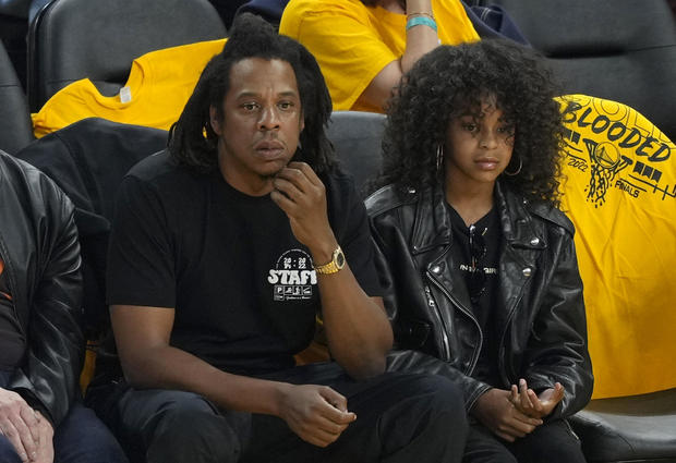 Rapper Jay-Z and his daughter Blue Ivy Carter look on during the second quarter of Game Five of the 2022 NBA Finals between the Boston Celtics and the Golden State Warriors at Chase Center on June 13, 2022 in San Francisco, California. 