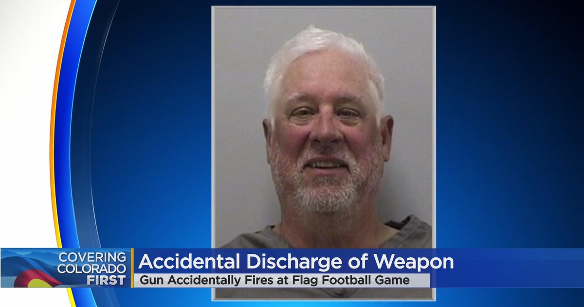 Man arrested after gun goes off at flag football game - CBS Colorado