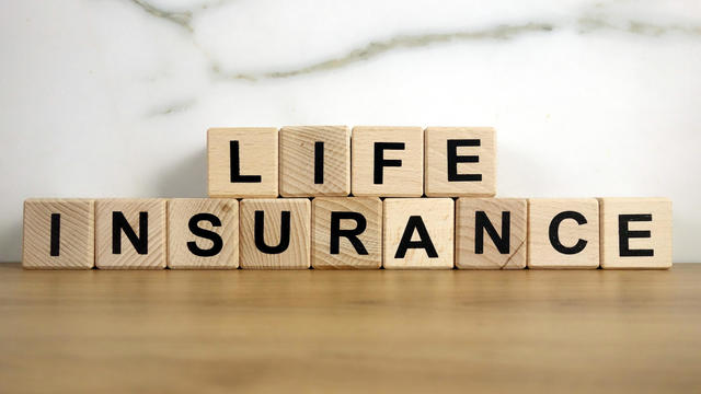 Life insurance text from wooden blocks 
