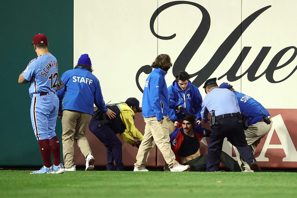 Fan Charged After Running Onto Field During World Series Game 5 CBS   Luke Lulevitch Phillies Trespass 