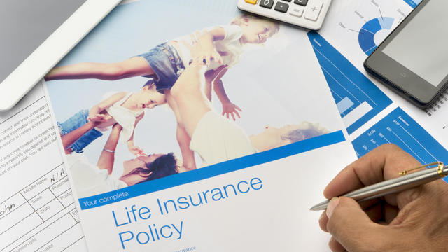 Life insurance brochure with family image 