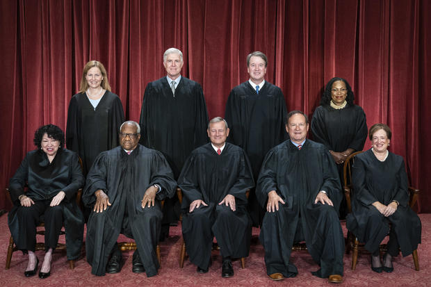 Members of the Supreme Court sit for a group photo on Friday, Oct. 7, 2022. 