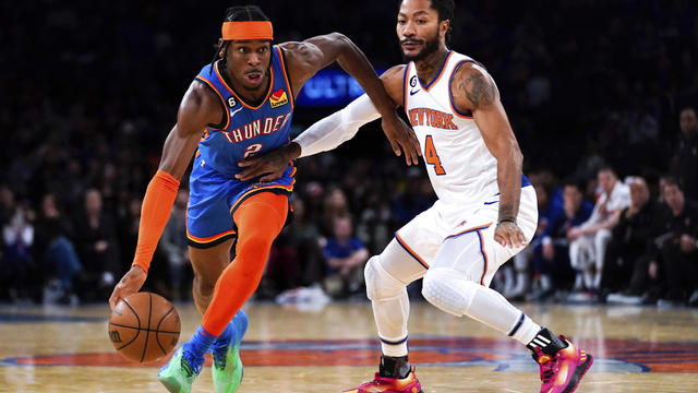New York Knicks guard Derrick Rose (4) attempts to guard Oklahoma City Thunder guard Shai Gilgeous-Alexander (2) during the second half of an NBA basketball game, Sunday, Nov. 13, 2022, in New York. 