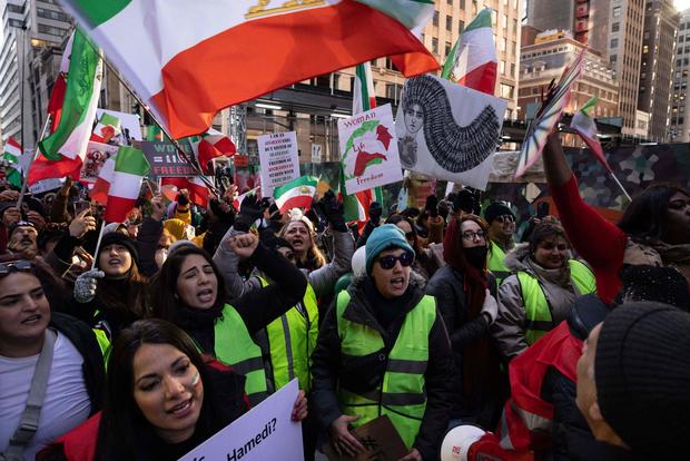 Protesters call on the United Nations to take action against the treatment of women in Iran, following the death of Mahsa Amini while in the custody of the morality police, during a demonstration in New York City on November 19, 2022. 