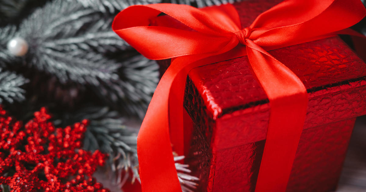 Gift Box With Red Ribbon High-Res Stock Photo - Getty Images