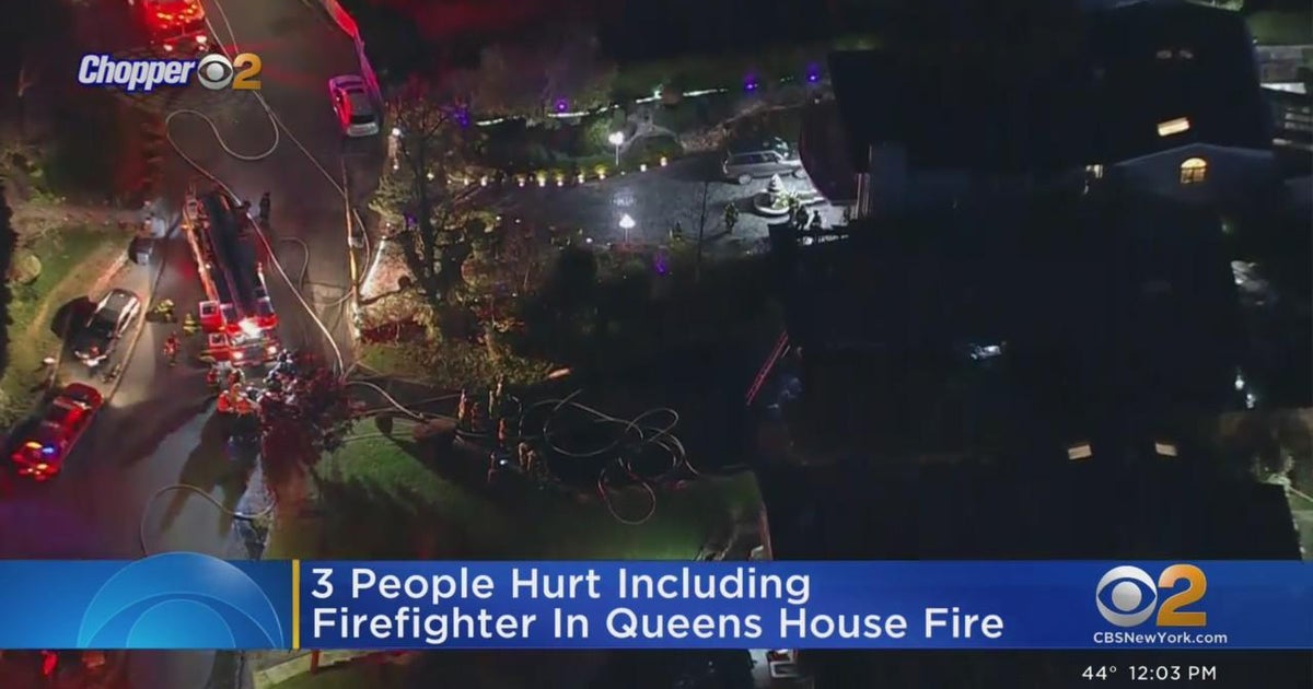 3 hurt, including firefighter, in Queens house fire - CBS New York
