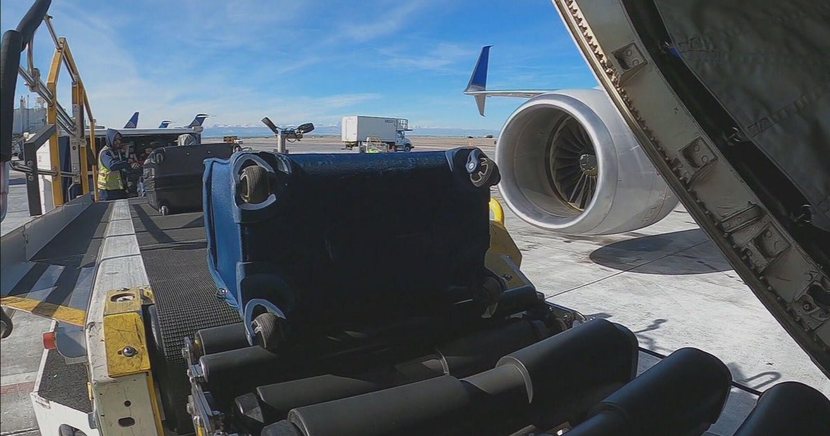 Where does your bag go after check in at Denver International Airport