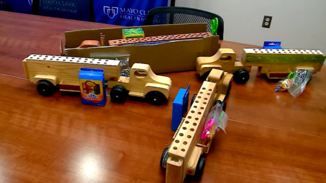 Wisconsin woodworker builds toy trucks for Ukrainian refugees 