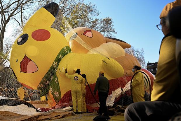 The Macy's Inflation Team prepare the Pikachu & Eevee balloons ahead of the 96th Macy's Thanksgiving Day Parade on the Upper West Side on November 23, 2022 in New York City. 