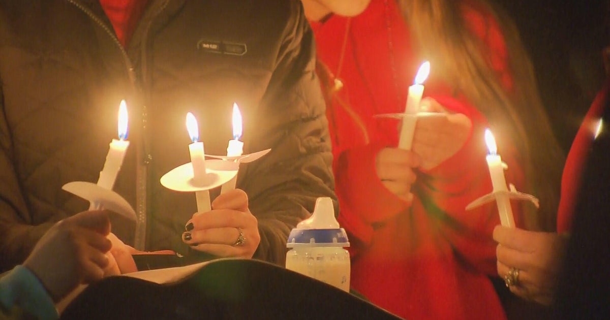 Hundreds attend vigil for teen who died after jumping into icy lake ...