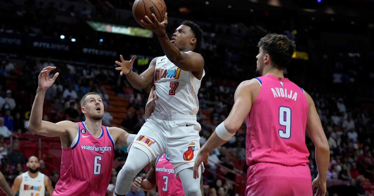 Heat hold on to conquer Wizards 110-107