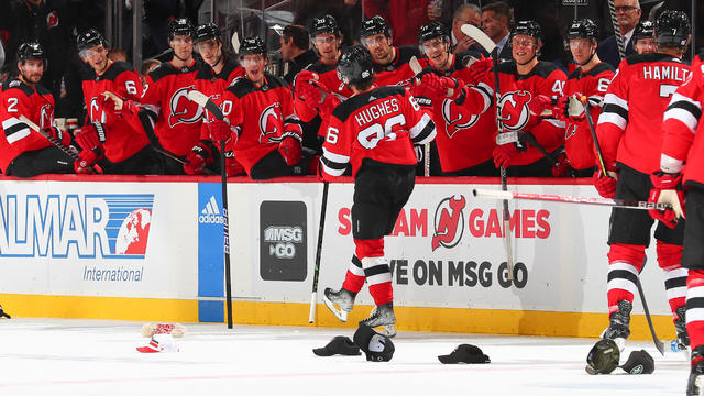 Jack Hughes #86 of the New Jersey Devils celebrates his goal with the bench in the third period of the game against the Washington Capitals on November 26, 2022 at the Prudential Center in Newark, New Jersey. 