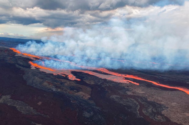 In this aerial photo released by the U.S. Geological Survey, the Mauna Loa volcano is seen erupting from vents on the Northeast Rift Zone on the Big Island of Hawaii, Nov. 28, 2022. 