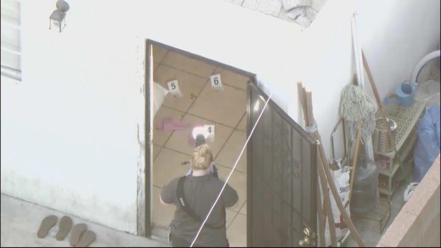 Generic police lights and yellow police tape at crime scene 