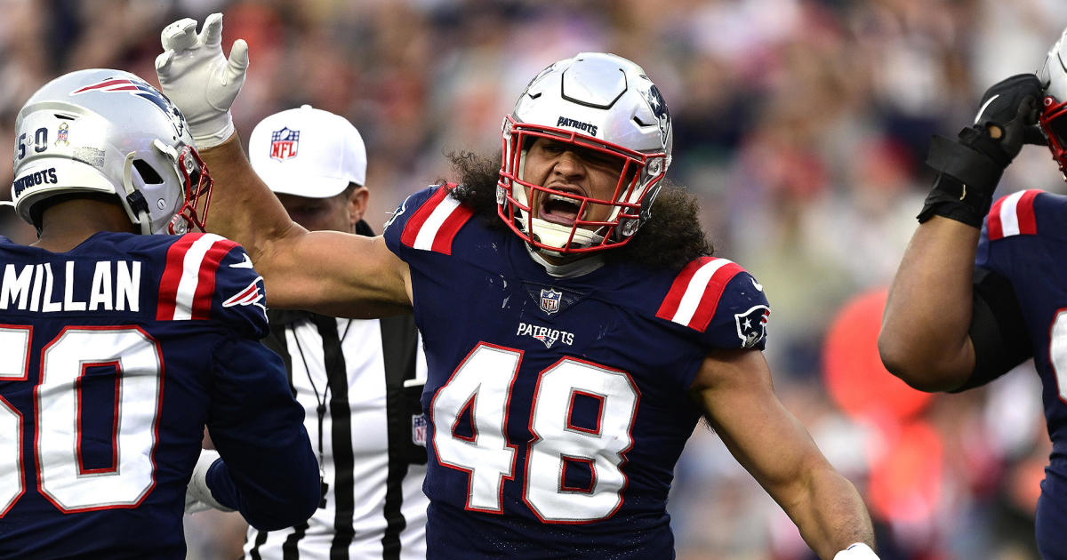 New England Patriots linebacker Jahlani Tavai (48) walks on the sidelines  during an NFL football game against the Miami Dolphins, Sunday, Jan. 9,  2022, in Miami Gardens, Fla. (AP Photo/Doug Murray Stock