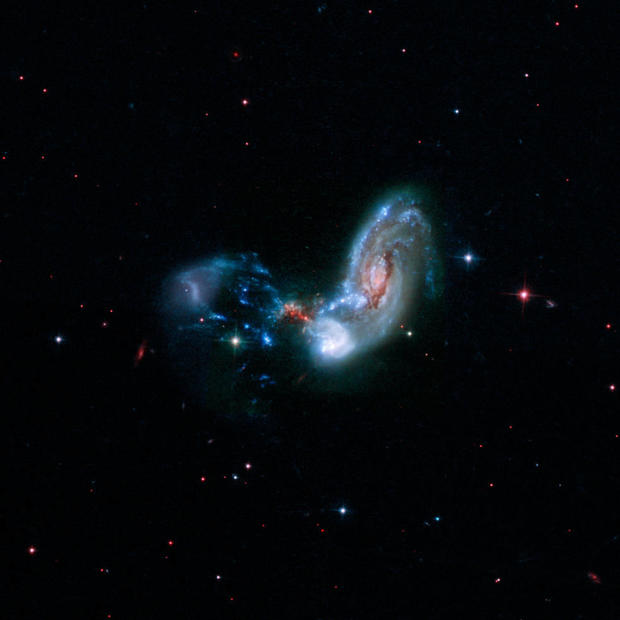 The merging galaxies known collectively as II Zw 096 are shown in this image from NASA's Hubble Space Telescope. 