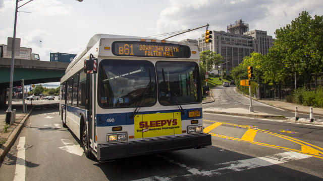 A MTA bus stops near the Brooklyn Queens Expressway and Atlantic Avenue intersection along the Long Island College Hospital campus June 19, 2015 in the Brooklyn borough of New York. 