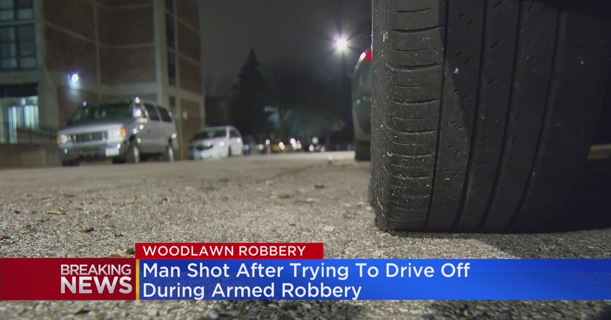 Man shot after trying to drive off during armed robbery in Woodlawn ...