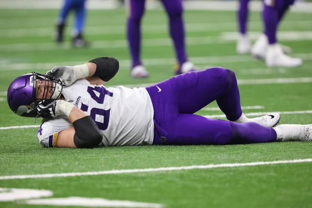 Minnesota Vikings offensive tackle Blake Brandel (64) looks at a