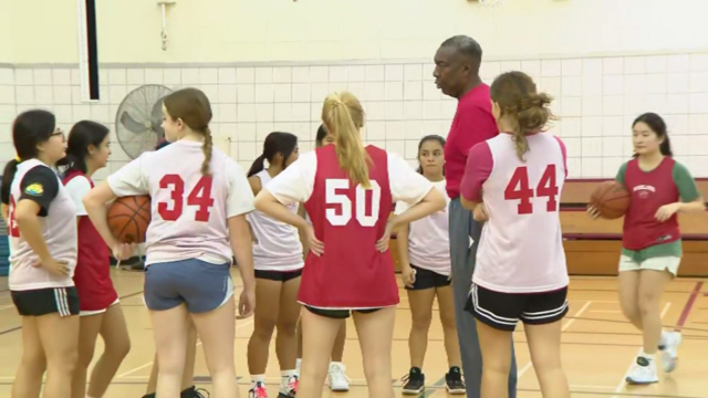 Larry Farmer coaching Woodlands Academy girls' basketball 