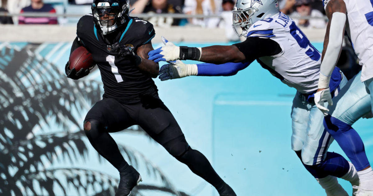Cowboys fall to Jaguars on interception returned for TD 40-34 in