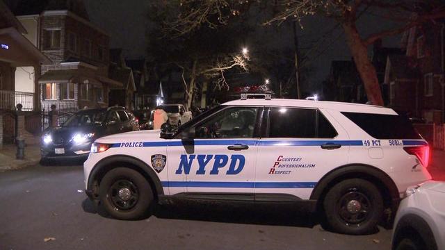 An NYPD vehicle blocks off a residential street. 