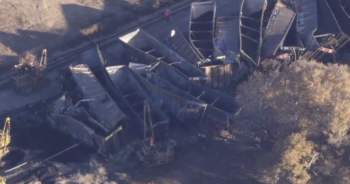 Train carrying iron ore derails in Victorville; more than a dozen cars ...