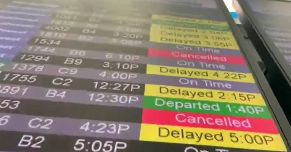 Miami International Airport grounds all departures due to inclement weather, hours-long delays expected throughout Saturday